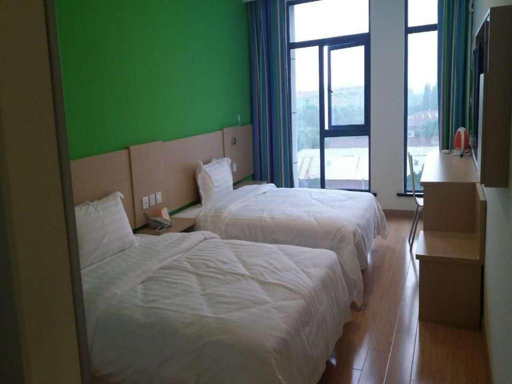 7 Days Inn Shanghai Minhang Dongchuan Road Jiaotong University מראה חיצוני תמונה